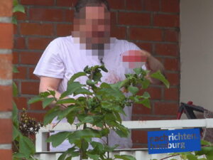 Der Mann auf dem Balkon